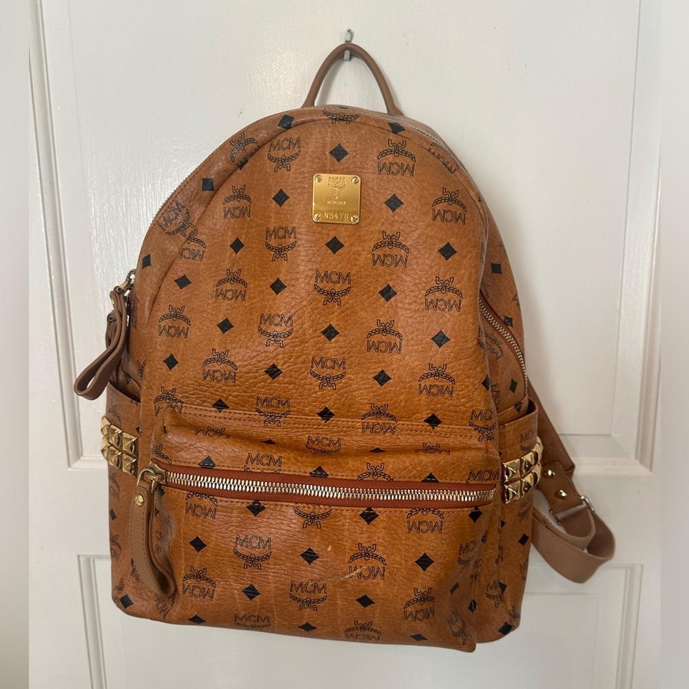 MCM women’s backpack style brown leather bag, good condition
